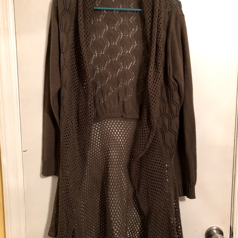 Olive green jacket with scalloped hem